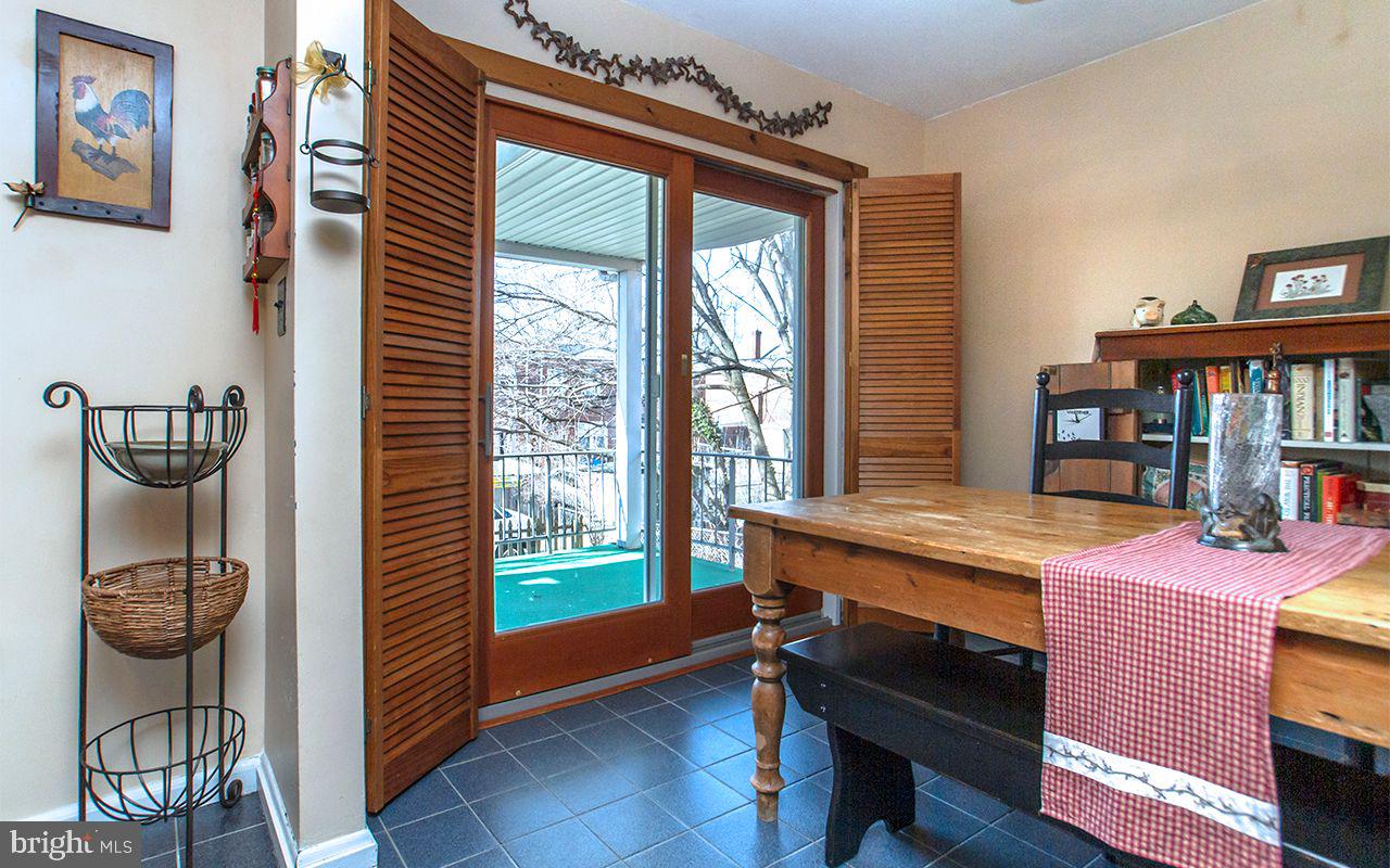 8324 Ridgely Oak Road Parkville, MD 21234 - Photo 5 of 36 Sliders Open to covered rear Deck