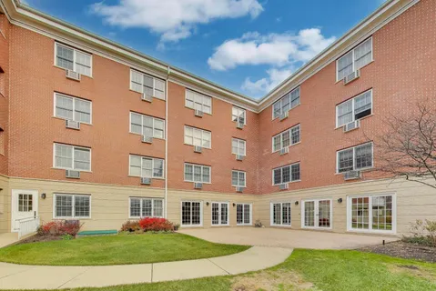 a view of a yard in front of a building