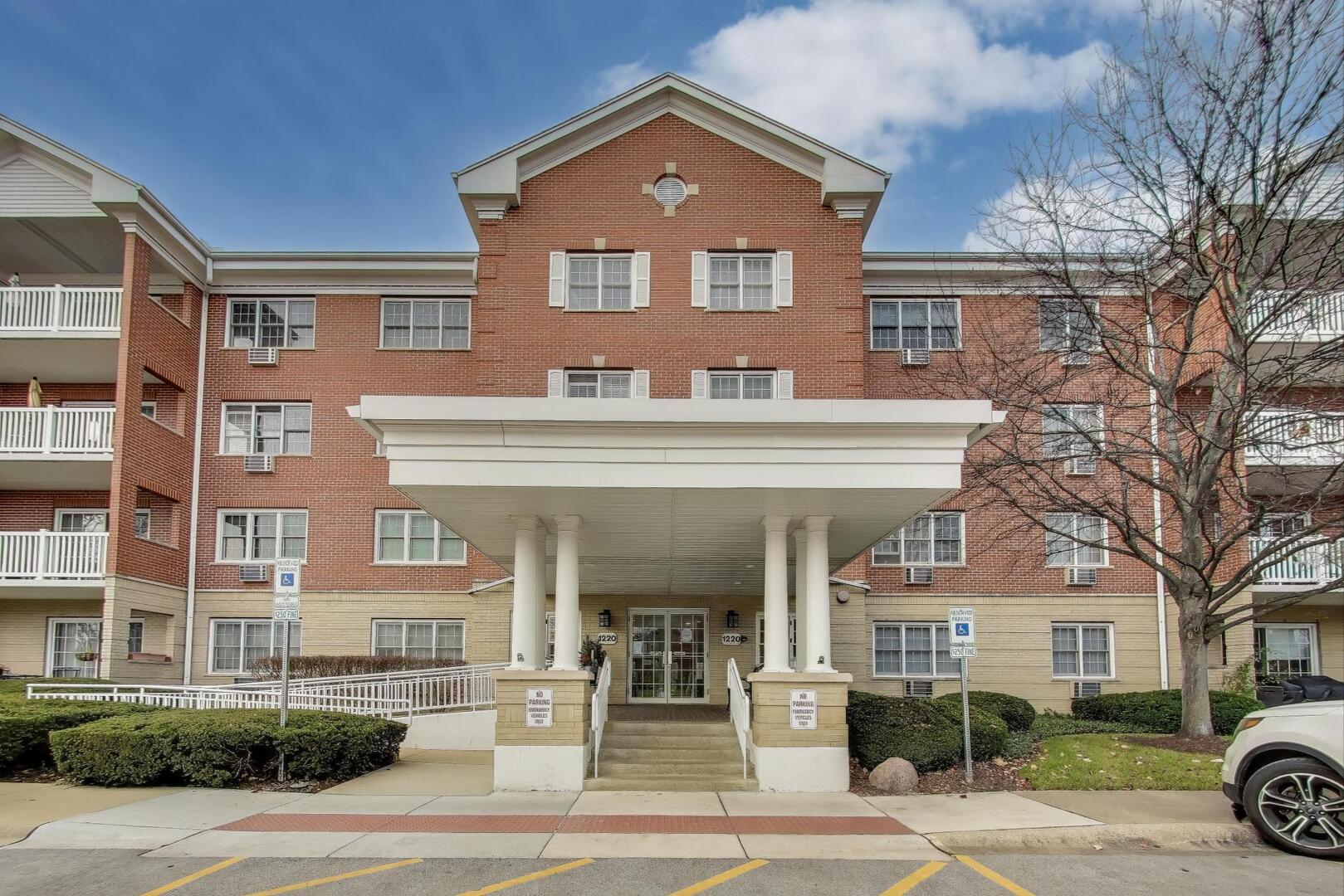1220 Depot Street, Unit 109 Glenview, IL 60025 - Photo 3 of 35 a front view of a house