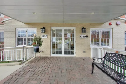 a porch with a bench