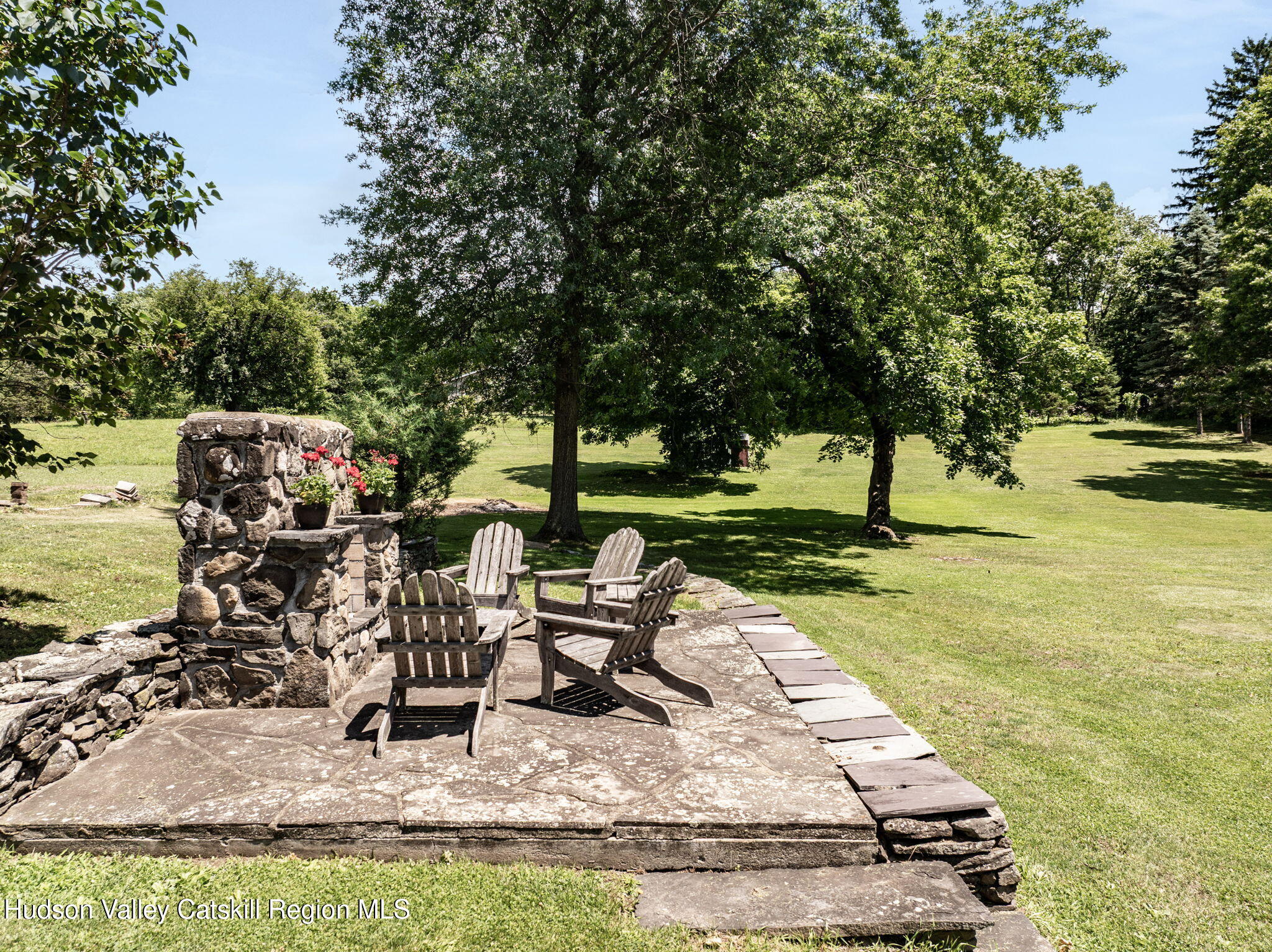 16 Carriage House Road Catskill, NY 12414 - Photo 60 of 74 outdoor fireplace with fieldstone patio