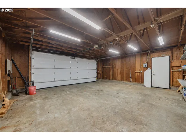 a view of a chairs and table in the patio