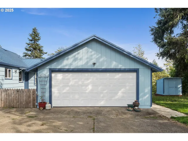 a house view with a garden space