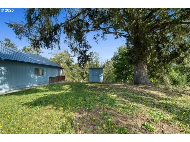 a backyard of a house with lots of green space