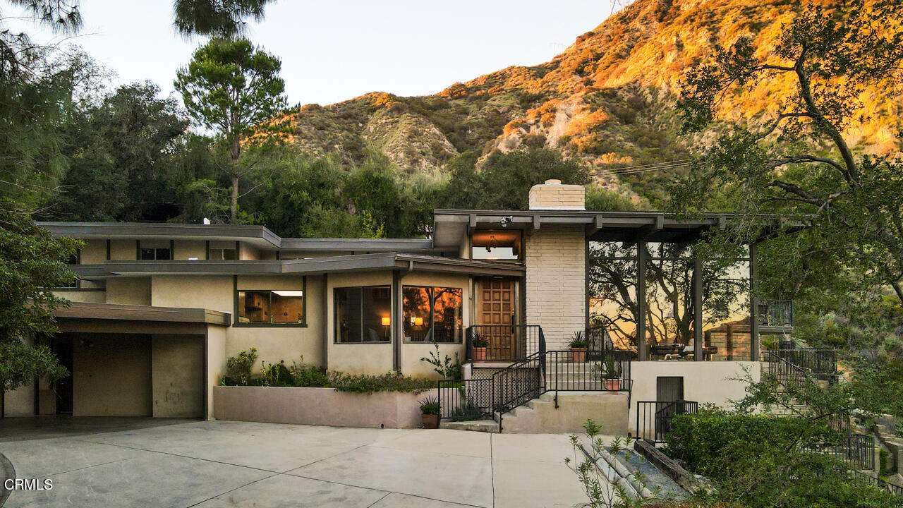 2207 Pinecrest Drive Altadena, CA 91001 - Photo 1 of 43 a front view of a house with a garden