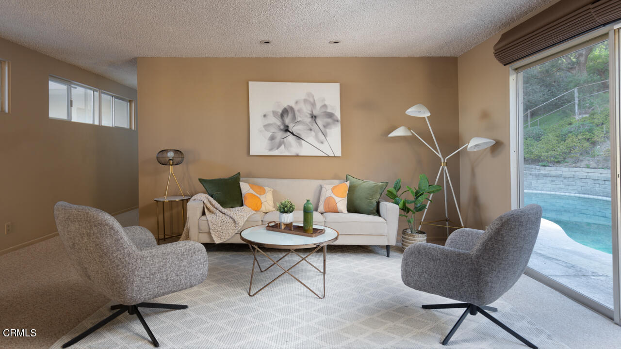 2207 Pinecrest Drive Altadena, CA 91001 - Photo 16 of 43 a living room with furniture and a large window
