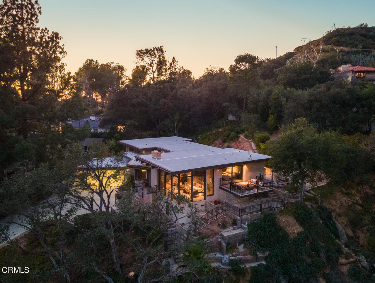 2207 Pinecrest Drive Altadena, CA 91001 - Photo 2 of 43 a view of a patio with table and chairs and a fire pit