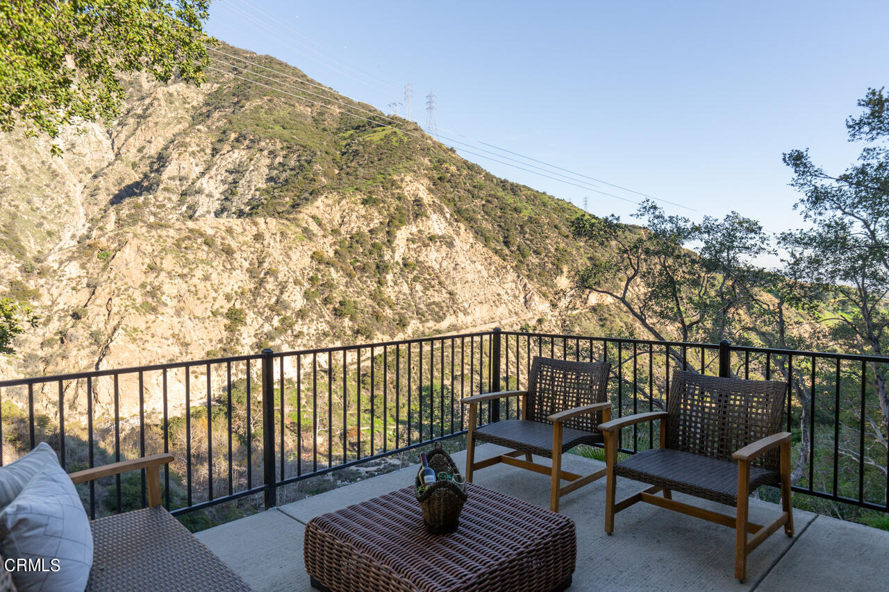 2207 Pinecrest Drive Altadena, CA 91001 - Photo 21 of 43 a balcony with wooden floor and outdoor seating