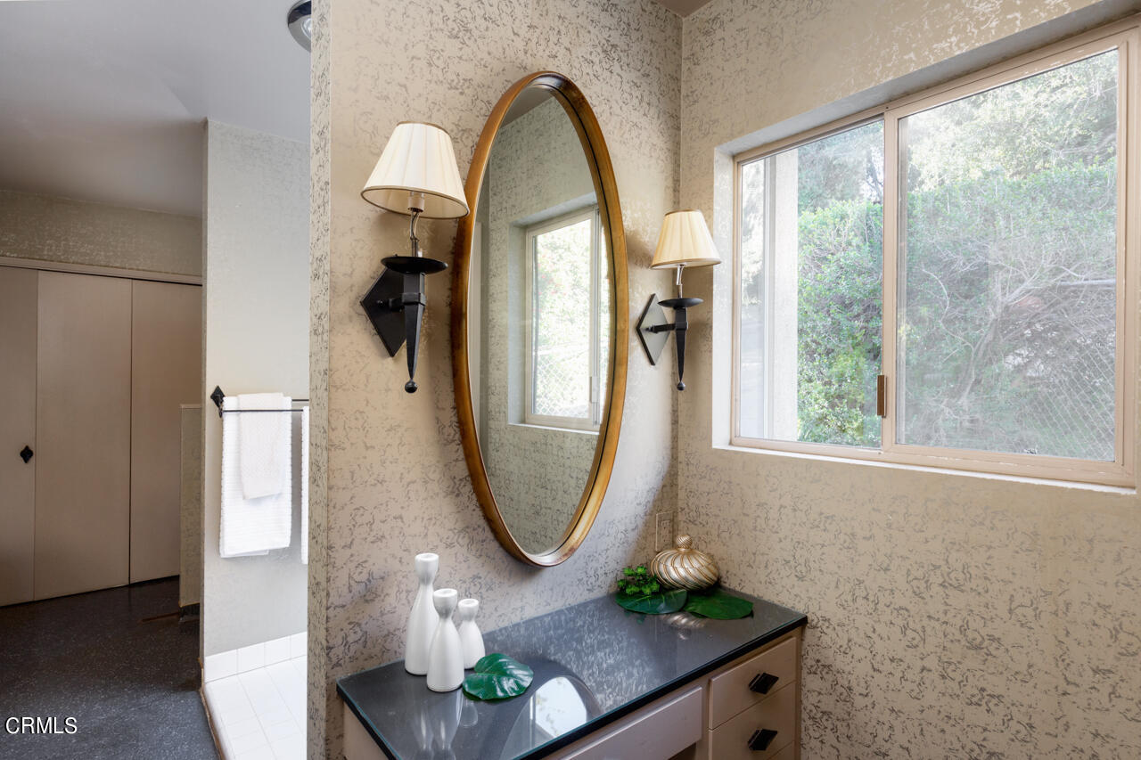 2207 Pinecrest Drive Altadena, CA 91001 - Photo 25 of 43 a view of a livingroom with furniture and a mirror
