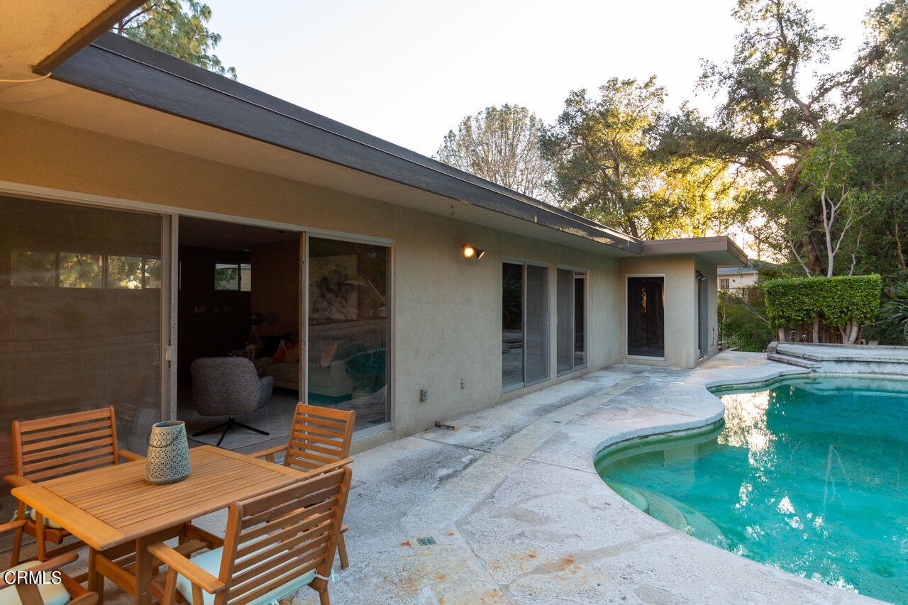 2207 Pinecrest Drive Altadena, CA 91001 - Photo 32 of 43 a view of a house with backyard sitting area and swimming pool