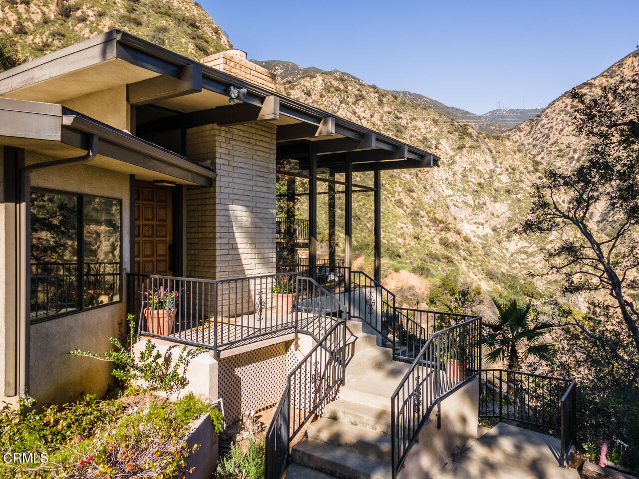 2207 Pinecrest Drive Altadena, CA 91001 - Photo 4 of 43 a view of a patio with couches table and chairs and potted plants