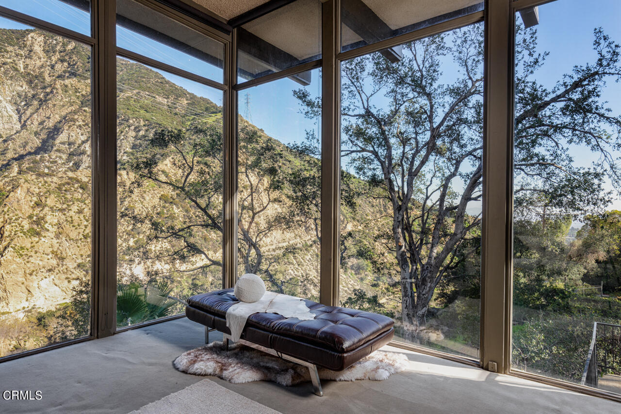 2207 Pinecrest Drive Altadena, CA 91001 - Photo 8 of 43 a sitting area with furniture and wooden floor