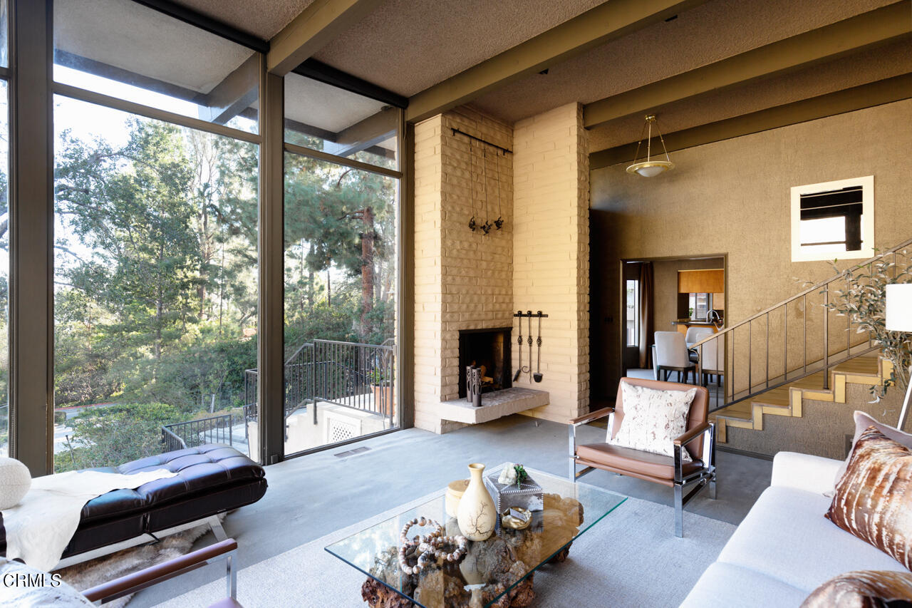 2207 Pinecrest Drive Altadena, CA 91001 - Photo 9 of 43 a living room with furniture and a large window