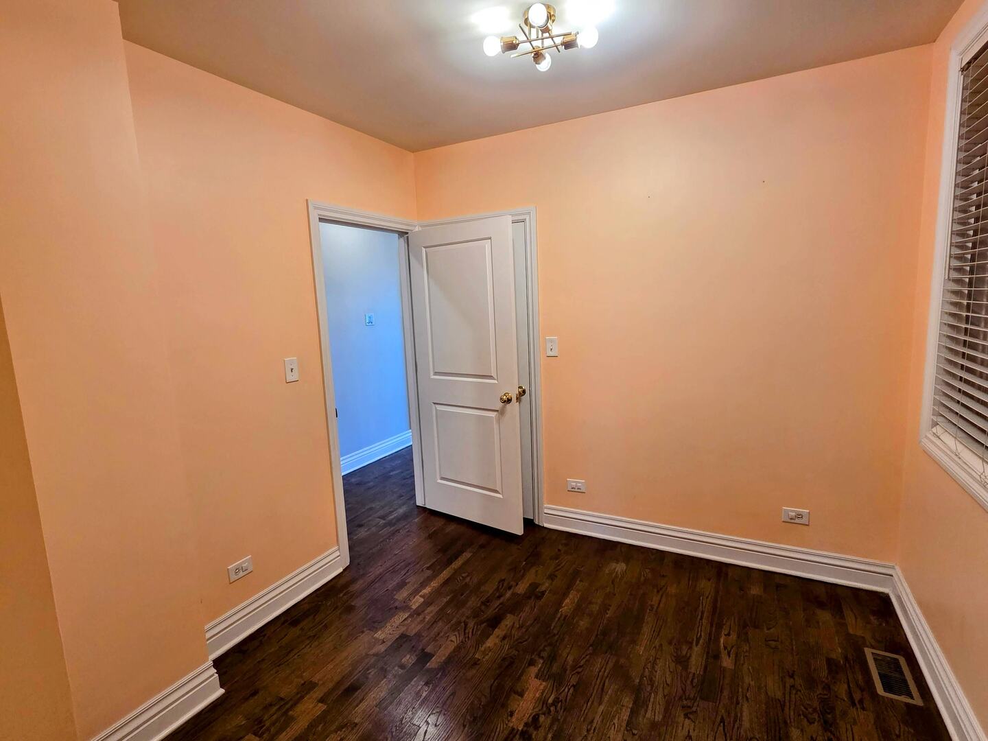 1422 North Noble Street, Unit 2S Chicago, IL 60642 - Photo 11 of 15 an empty room with wooden floor