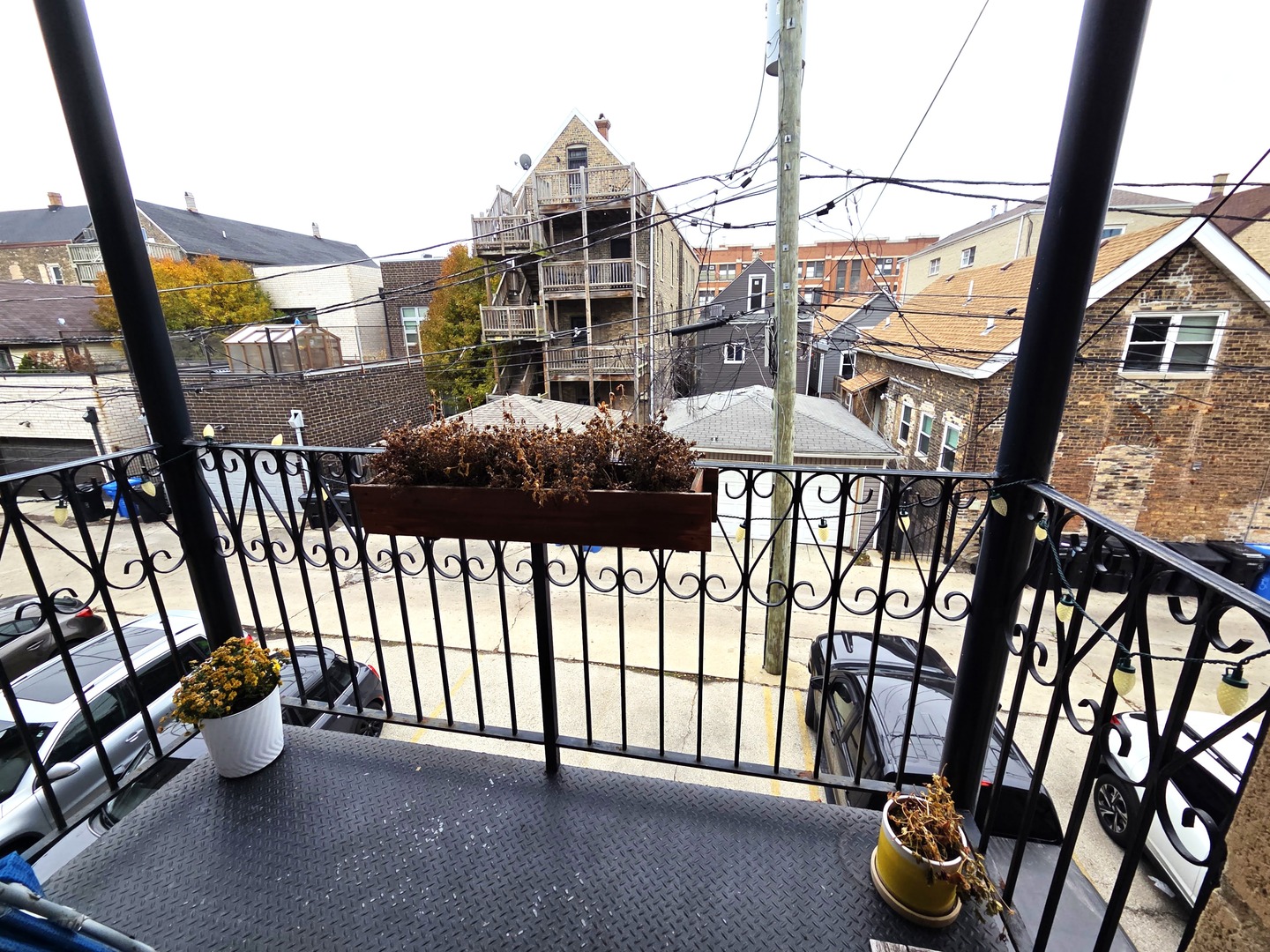 1422 North Noble Street, Unit 2S Chicago, IL 60642 - Photo 15 of 15 a view of an chairs and table in the balcony