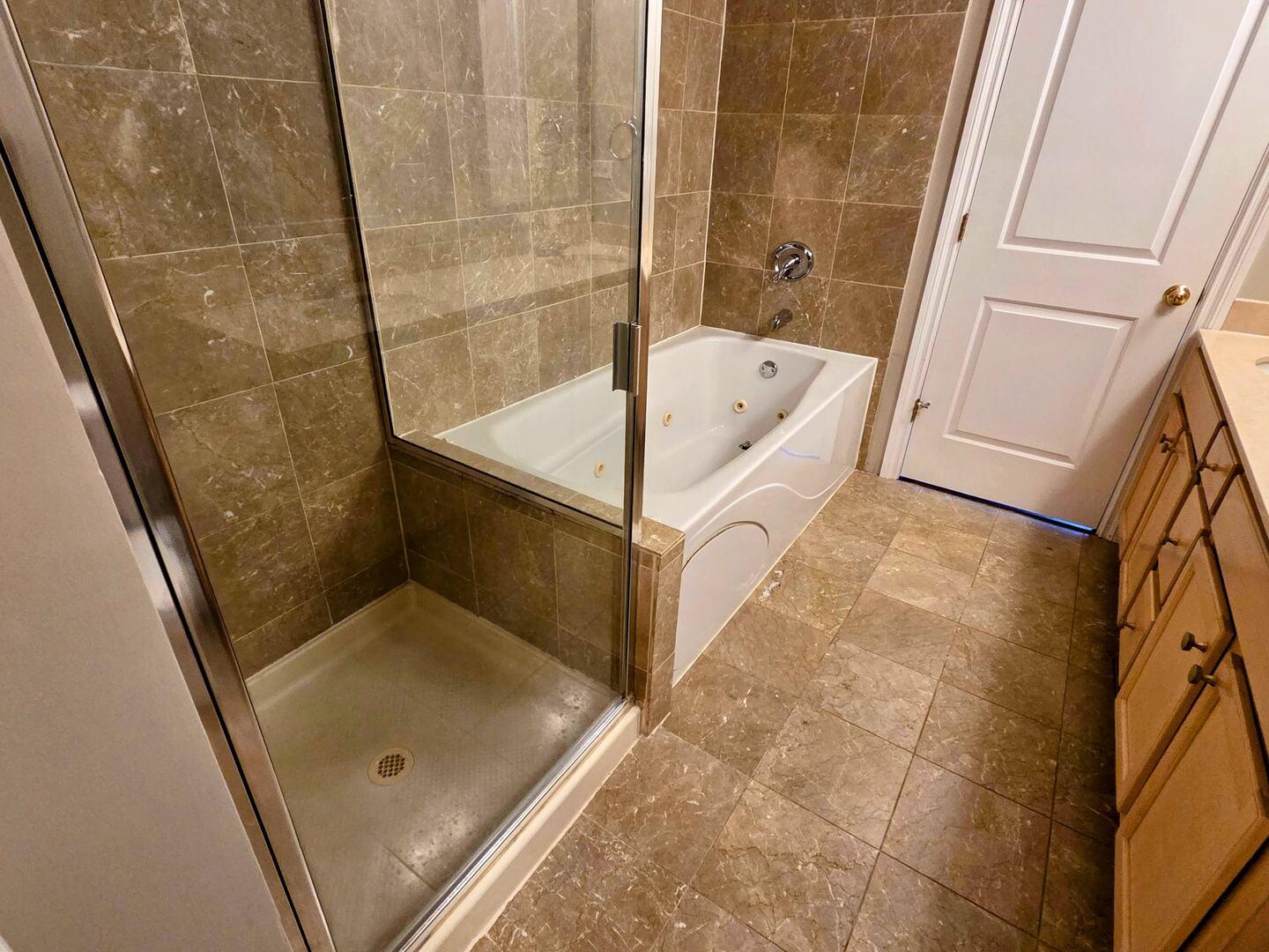 1422 North Noble Street, Unit 2S Chicago, IL 60642 - Photo 9 of 15 a bathroom with a tub and shower