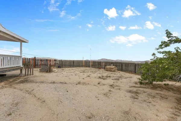 a view of an outdoor sitting area with couch