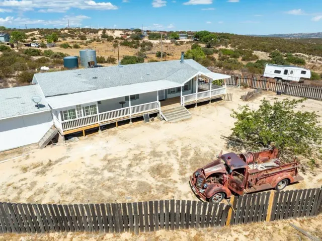a view of a terrace with a lake view