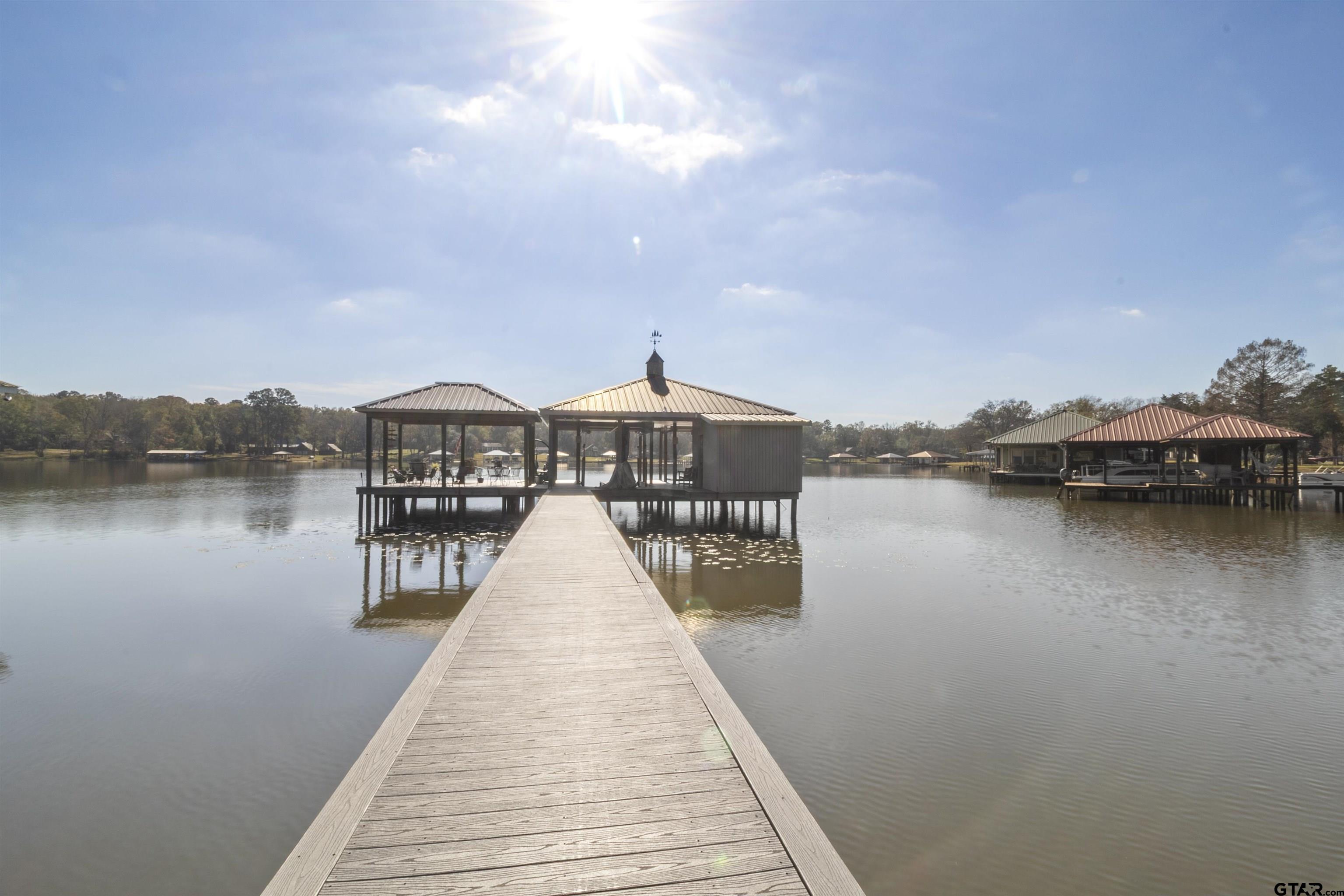 a house view with a lake view