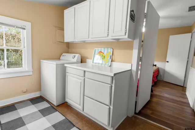 a utility room with dryer and washer