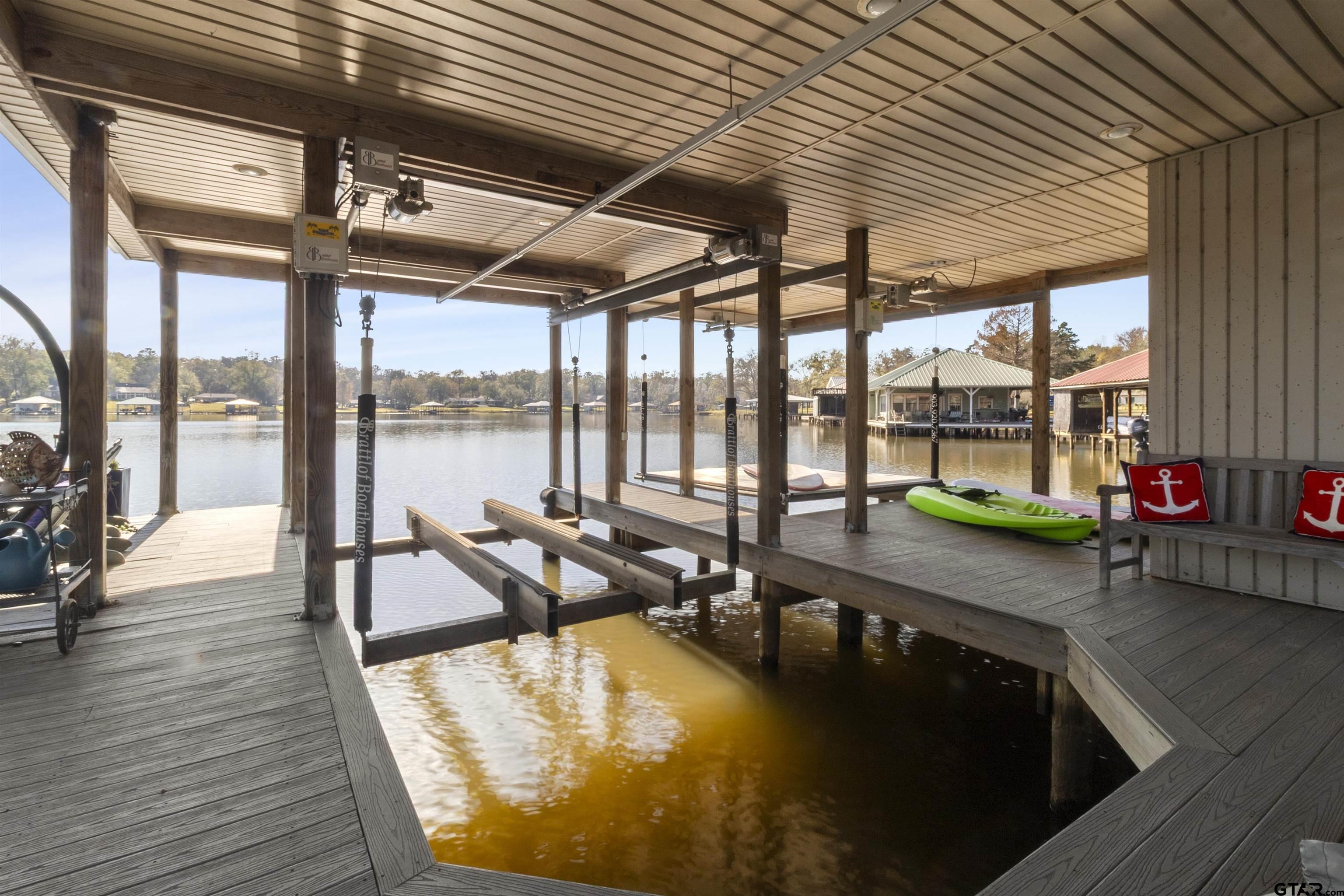 14131 West Peninsula Road Whitehouse, TX 75791 - Photo 22 of 28 a view of a swimming pool with outdoor seating