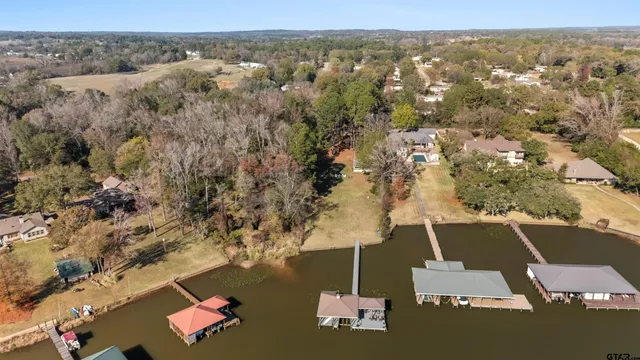 an aerial view of house with yard