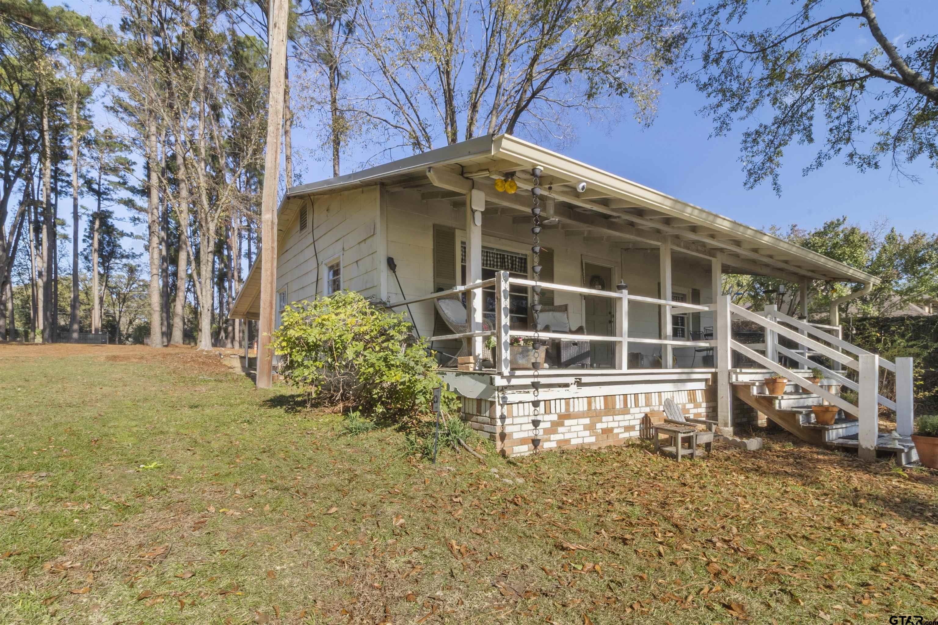 14131 West Peninsula Road Whitehouse, TX 75791 - Photo 5 of 28 a view of a house with a yard