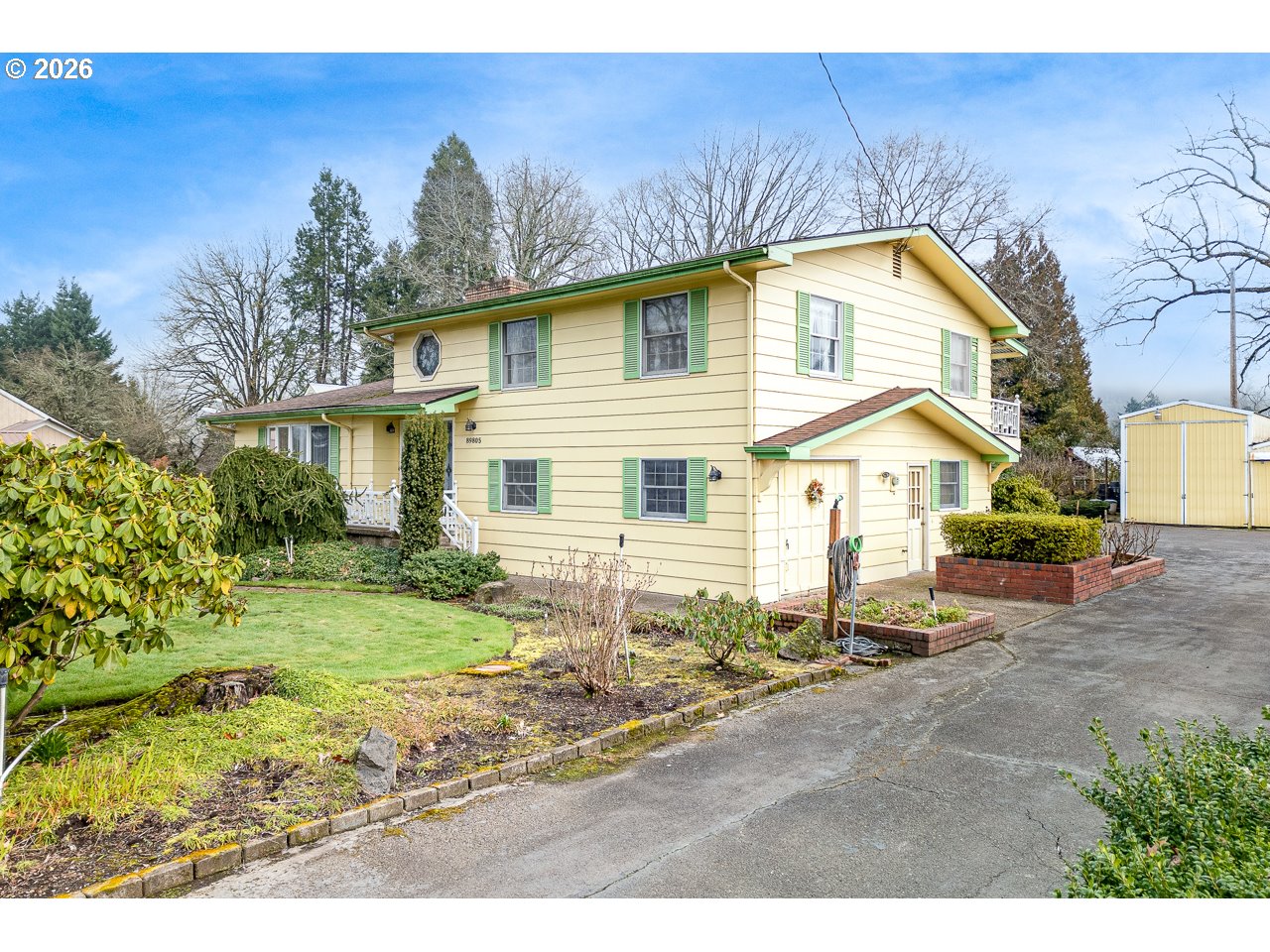 89805 Sprague Road Eugene, OR 97408 - Photo 7 of 48 a view of a house with a yard
