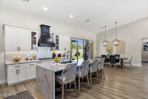 a view of a dining room and chairs in a kitchen