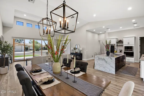 a work room with furniture and wooden floor