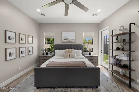 a large white bed in a white room