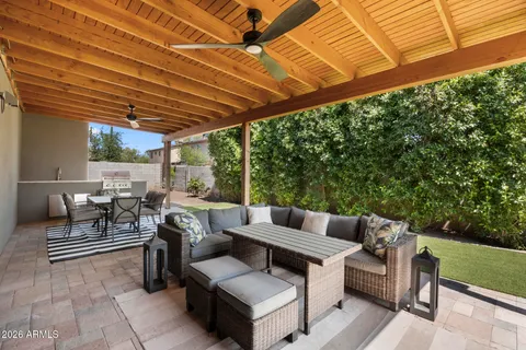 a outdoor living space with furniture and garden view