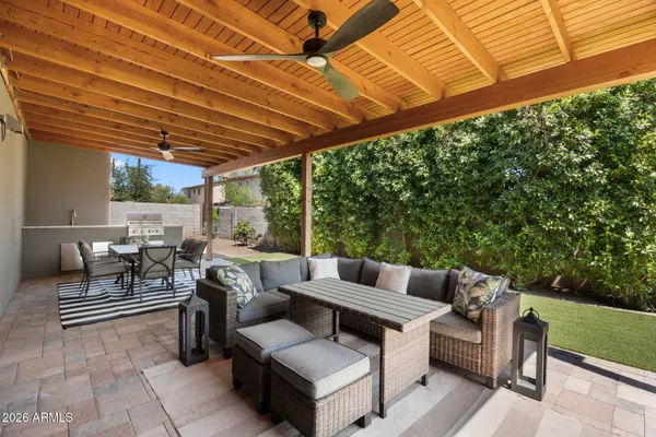 a outdoor living space with furniture and garden view