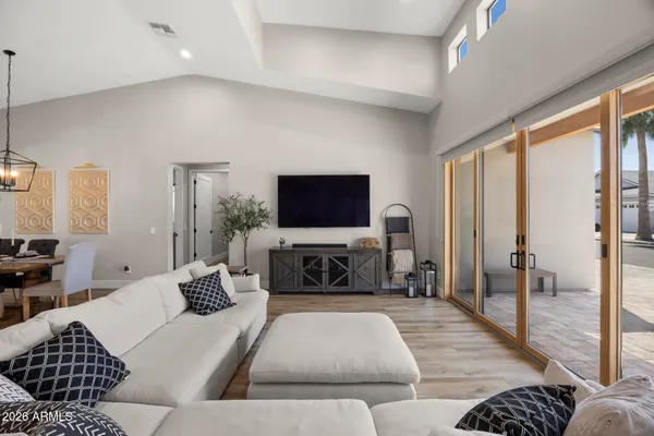a living room with furniture or couch and a flat screen tv