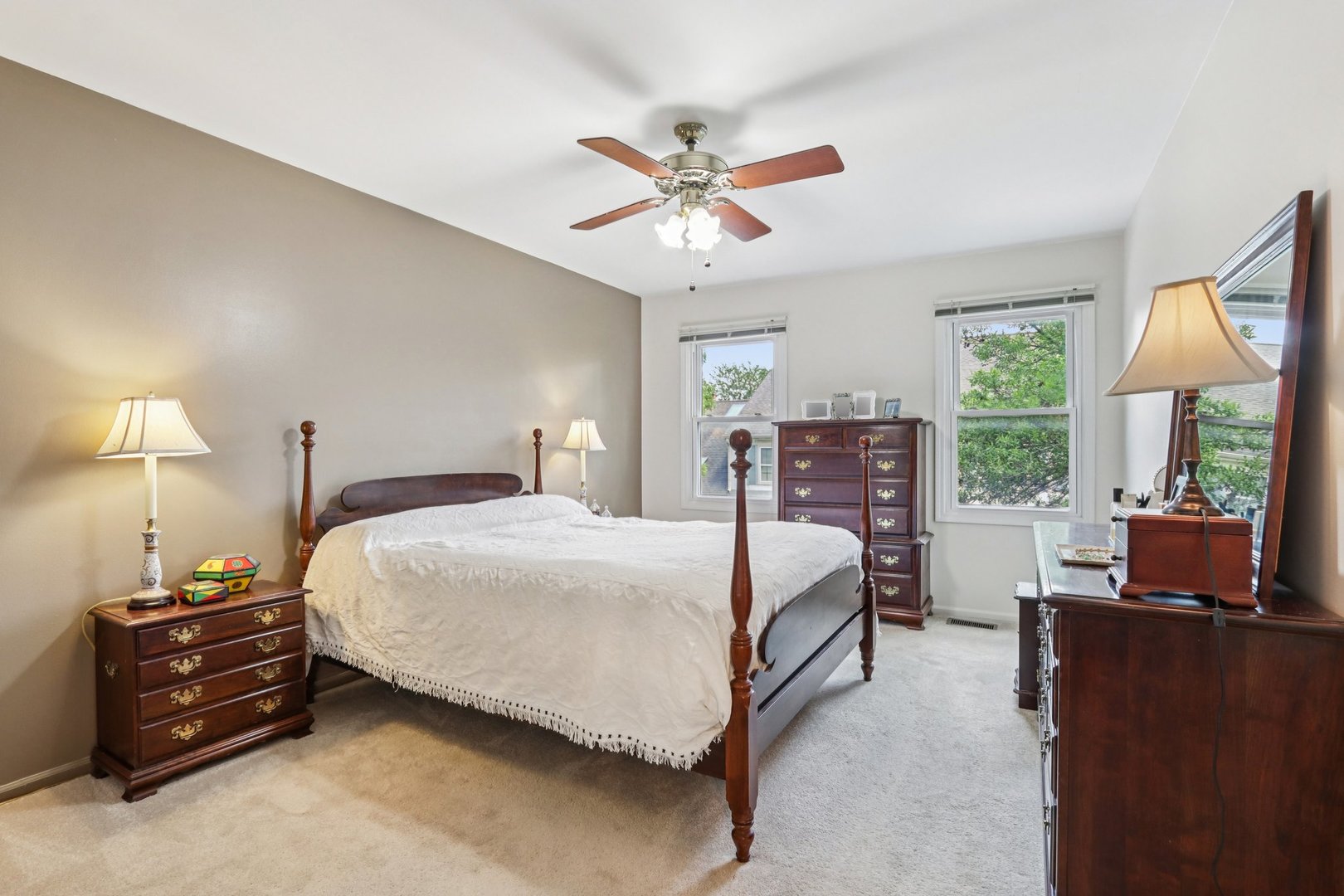 2547 College Hill Circle, Unit 404 Schaumburg, IL 60173 - Photo 20 of 28 a bedroom with a bed and wooden floor