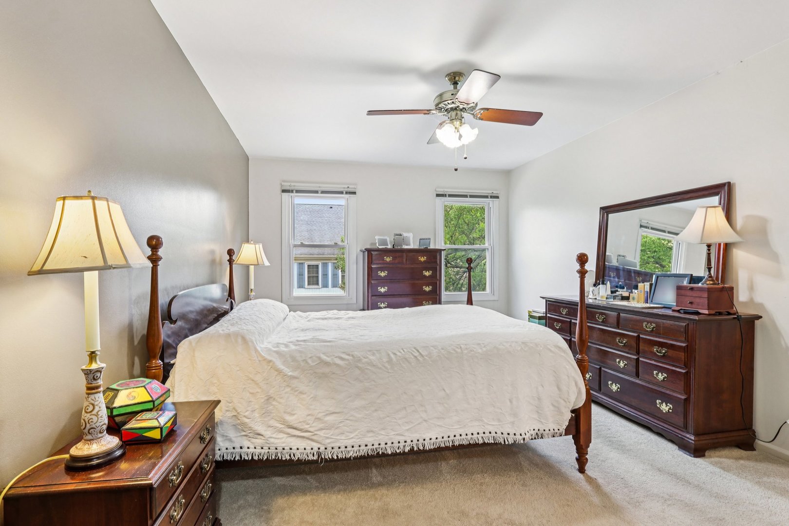2547 College Hill Circle, Unit 404 Schaumburg, IL 60173 - Photo 21 of 28 a bedroom with a bed and wooden floor