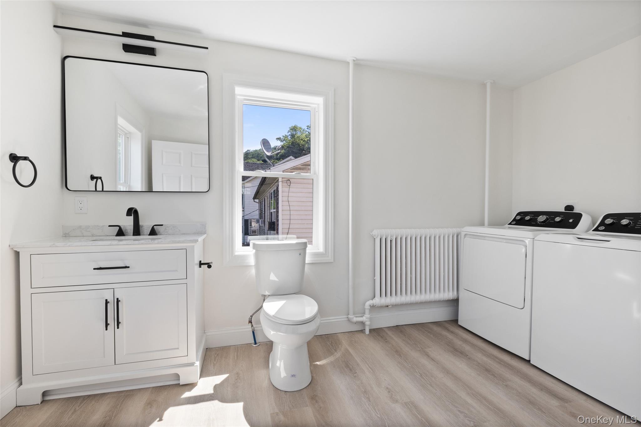 103 South Broad Street Peekskill, NY 10566 - Photo 11 of 25 Downstairs half bathroom and laundry