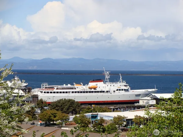 a front view of a building with sitting area