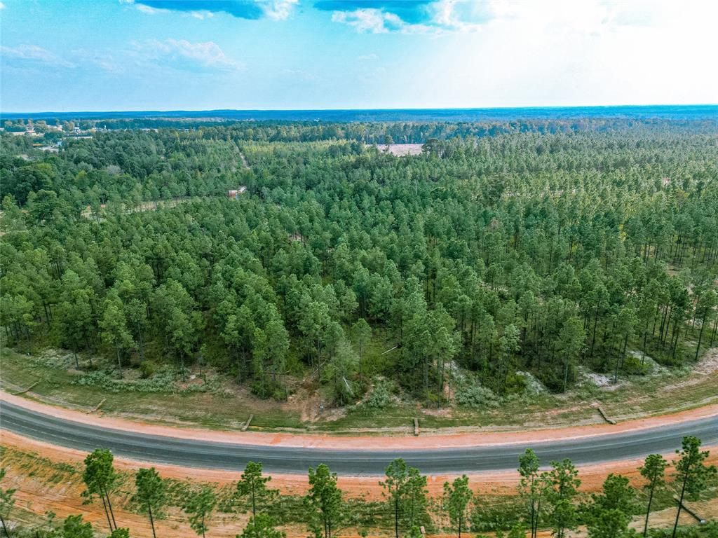 213 Millwood Loop, Unit 7 Minden, LA 71055 - Photo 15 of 20 a view of a yard with an outdoor seating