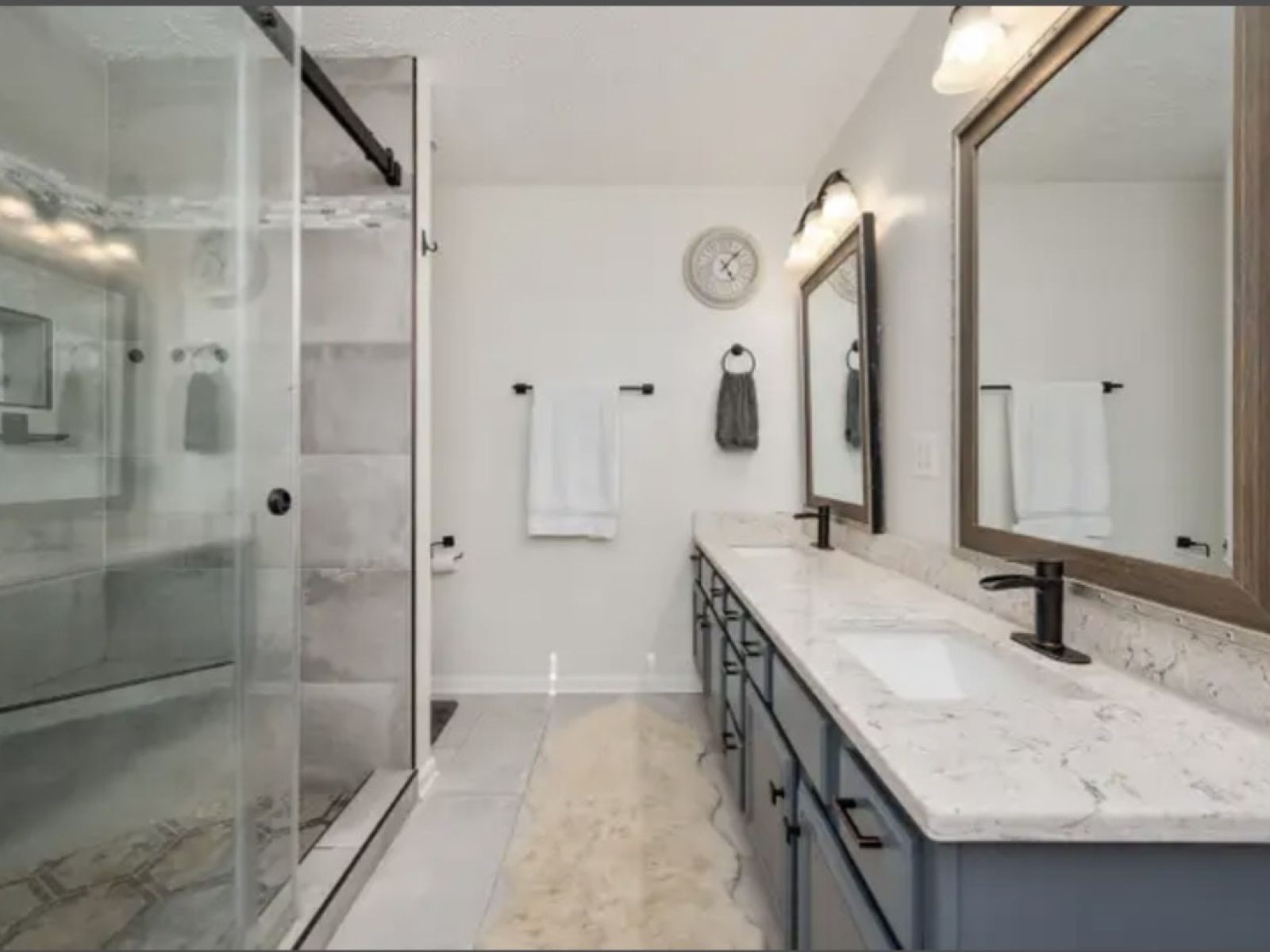 1123 Bramble Trail Murfreesboro, TN 37129 - Photo 5 of 10 a bathroom with a granite countertop sink a mirror and shower