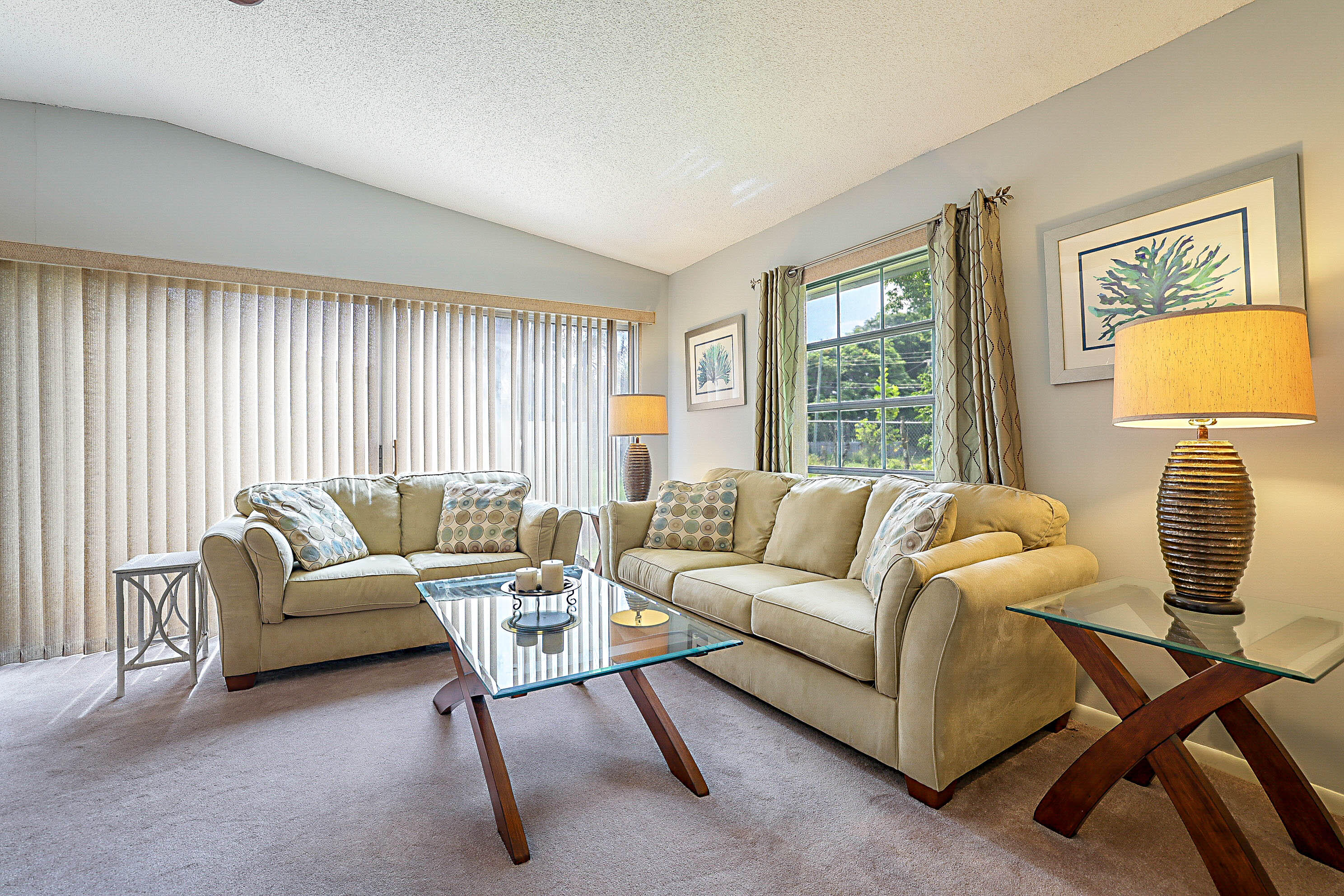 5231 Copperleaf Circle Delray Beach, FL 33484 - Photo 4 of 31 a living room with furniture and a window