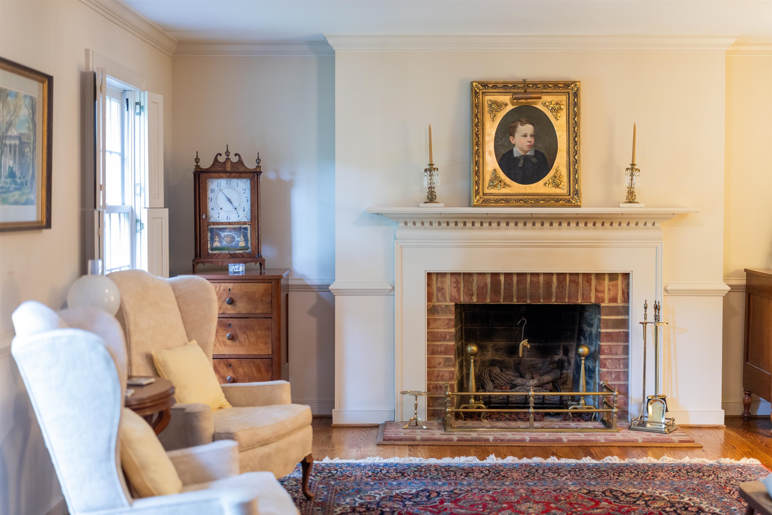 1430 Dogwood Road Staunton, VA 24401 - Photo 17 of 68 a living room with furniture a clock and a fireplace