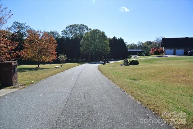 a view of a playground with basketball court