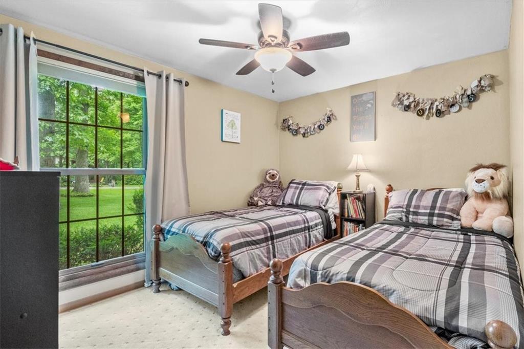 206 Ridgeway Drive Baden, PA 15005 - Photo 16 of 25 a bedroom with three beds and a large window