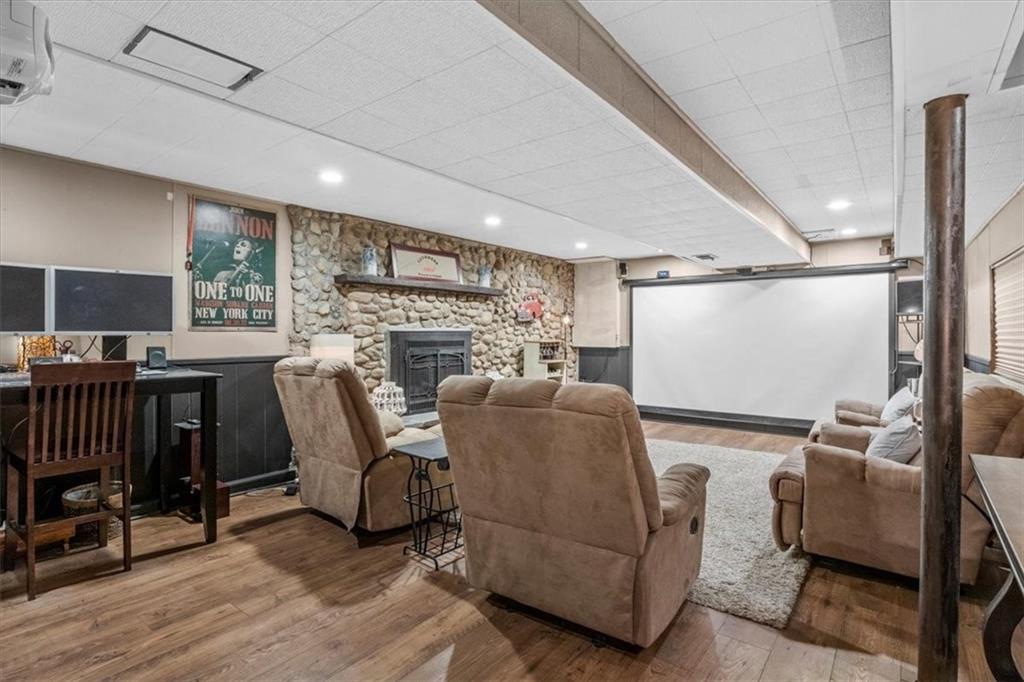 206 Ridgeway Drive Baden, PA 15005 - Photo 17 of 25 a living room with furniture and a floor to ceiling window