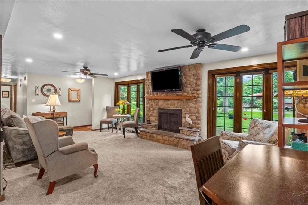 206 Ridgeway Drive Baden, PA 15005 - Photo 5 of 25 a living room with furniture fireplace and flat screen tv