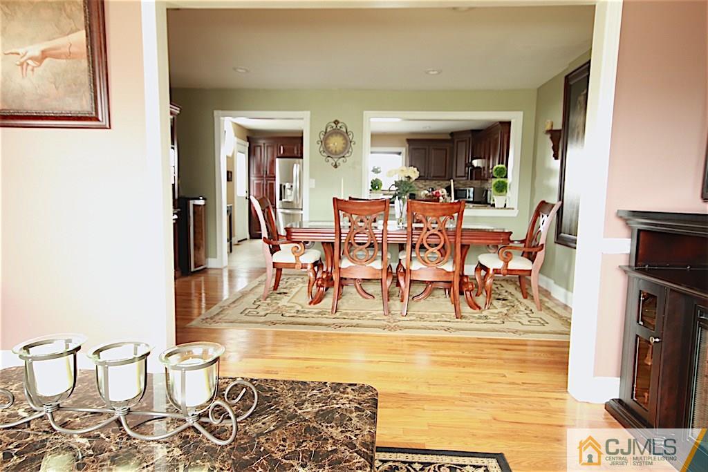 179 Midfield Road Colonia, NJ 07067 - Photo 5 of 18 a view of a dining room with furniture