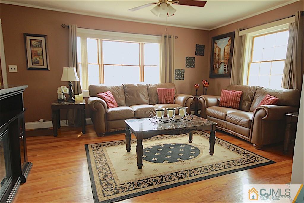 179 Midfield Road Colonia, NJ 07067 - Photo 6 of 18 a living room with furniture and a window