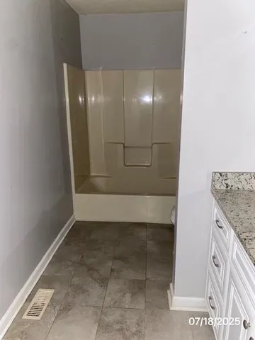 a view of backyard of house