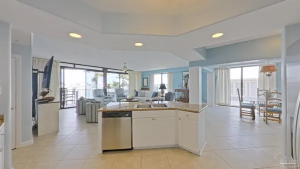 a bathroom with a tub and shower